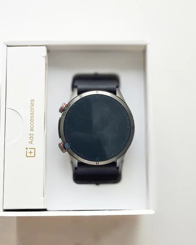 MSM smartwatch nestled in open retail box